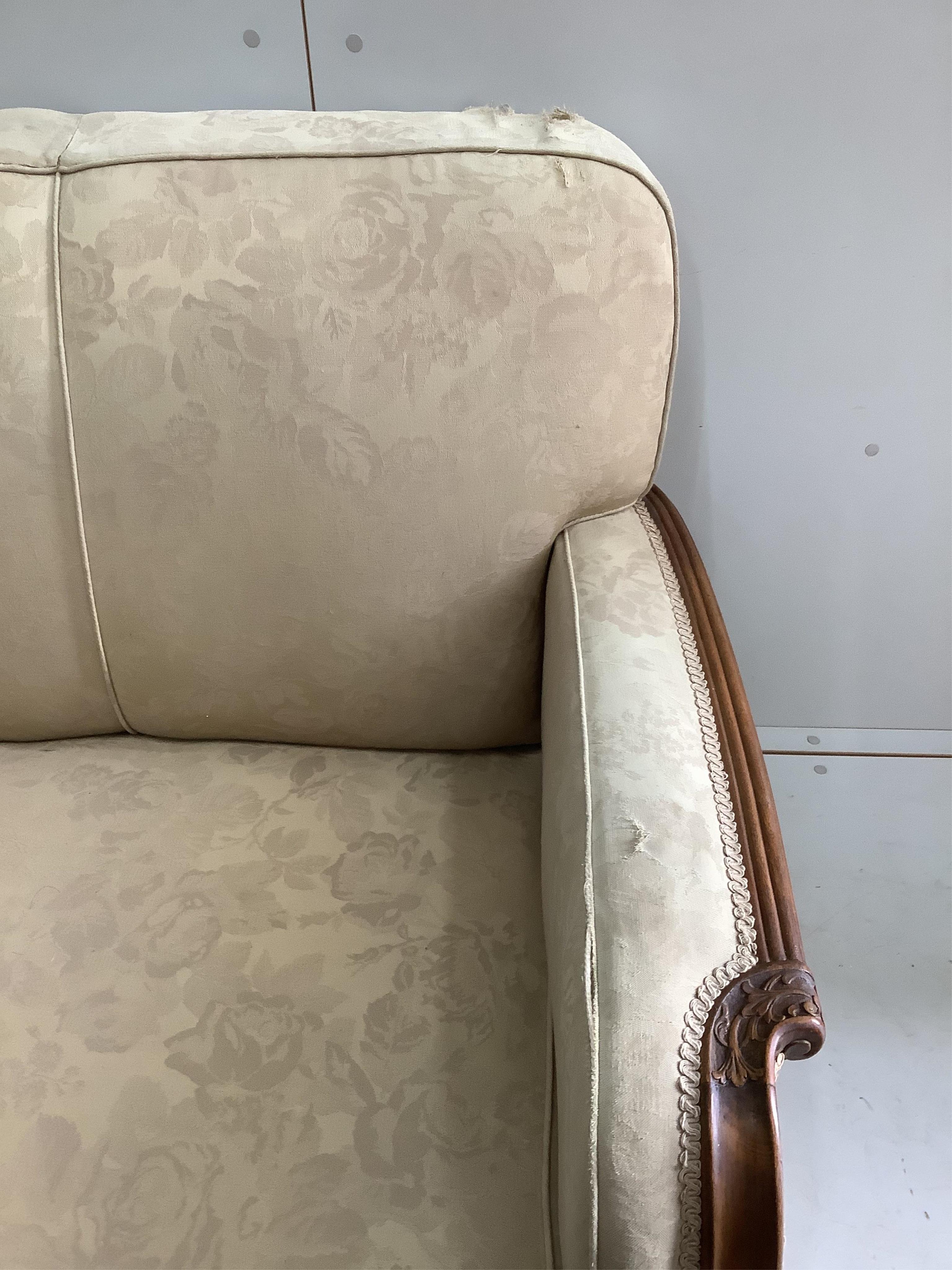 An Art Deco upholstered carved beech three piece suite, settee width 180cm, depth 80cm, height 82cm. Condition - fair, upholstery poor